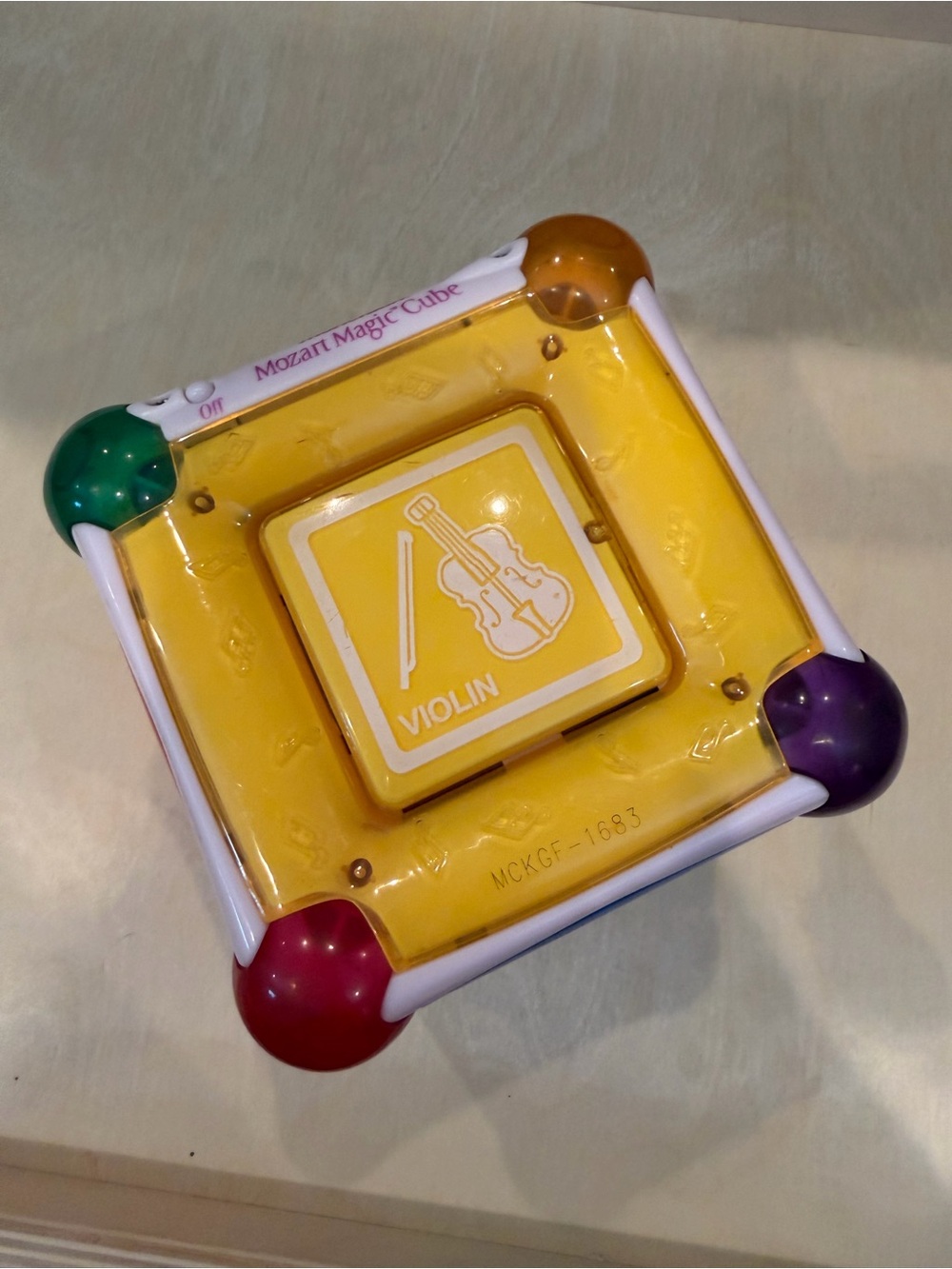 Munchkin Yellow Musical Magic Cube with Multicolor Corner Buttons
